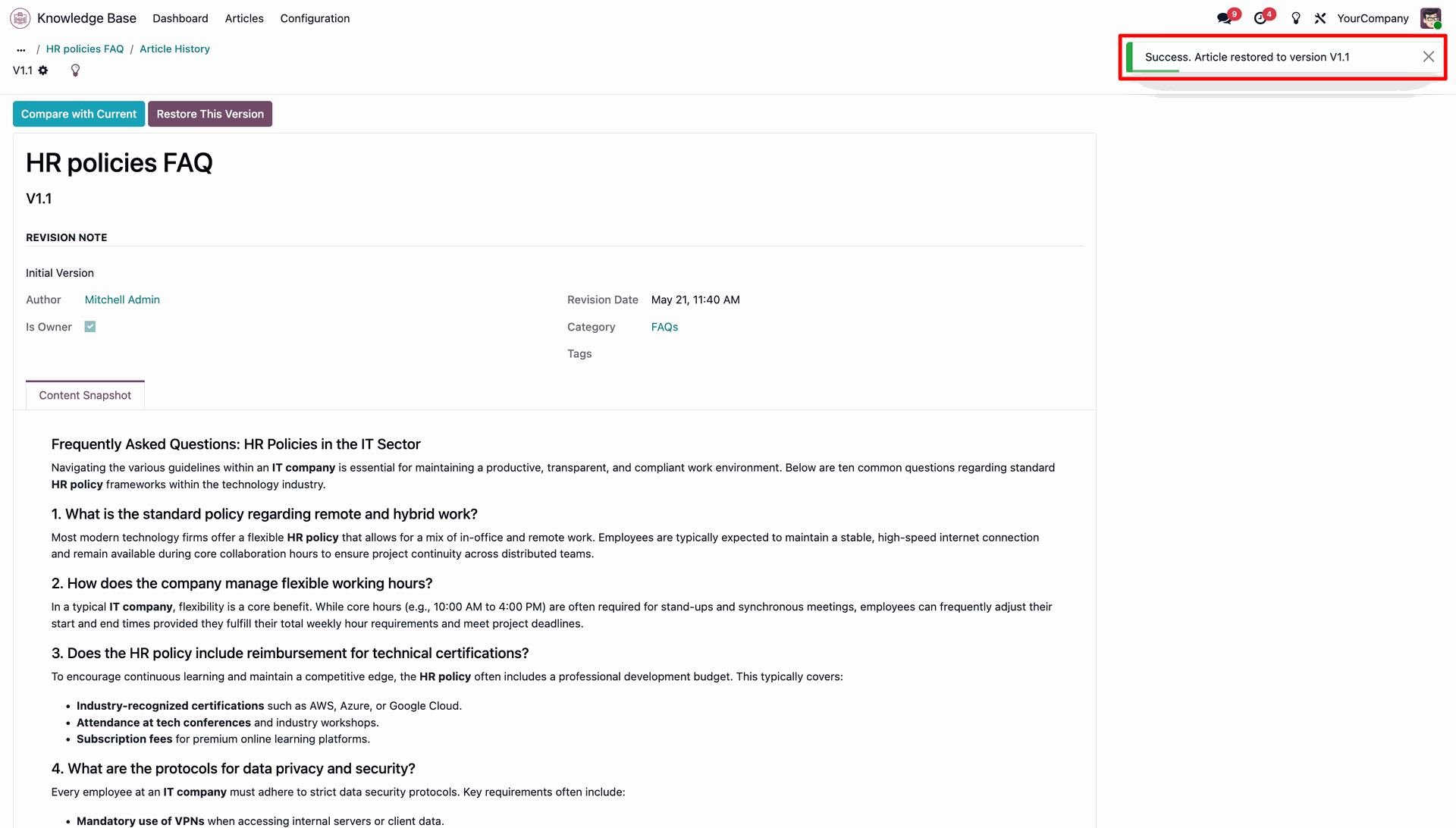 Article history page displaying a version restoration success banner